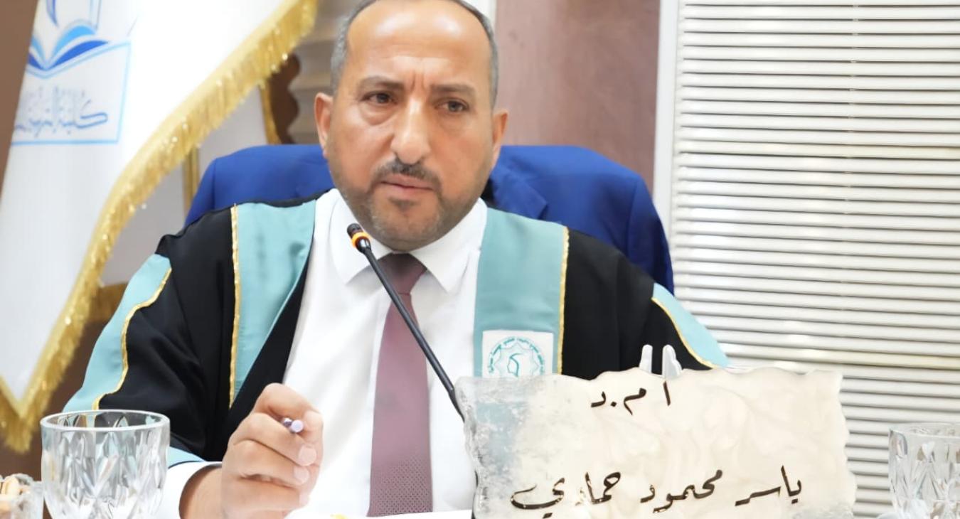 Faculty Member from the College of Education Participates in a Master’s Thesis Defense at Al-Iraqia University