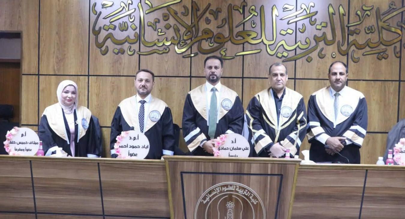 "The Head of the English Department participates in a master's thesis defense."